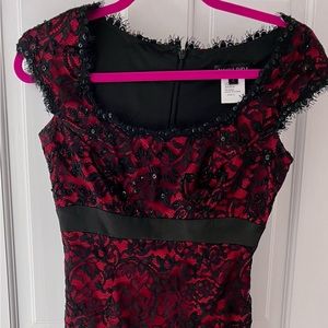 STUNNING red and black lace dress with intricate beading details. Cap sleeves.